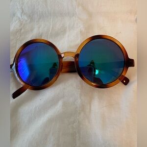 Vintage Round Tortoiseshell Sunglasses with Blue Reflective Lenses.